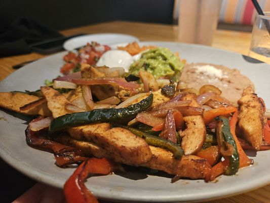 Palenque Kitchen by Mezcal signature dishes CarnitasFajitasPapas Bravas